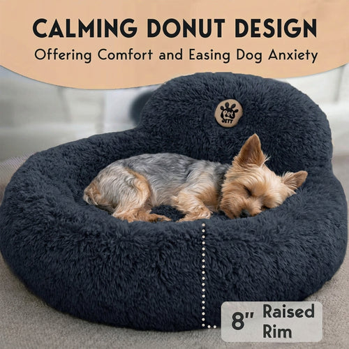 Dog lying on a dark blue donut-shaped pet bed with text about calming design and comfort.