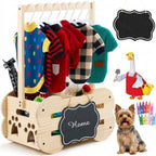 Wooden toy wardrobe with clothes and a dog sitting next to it